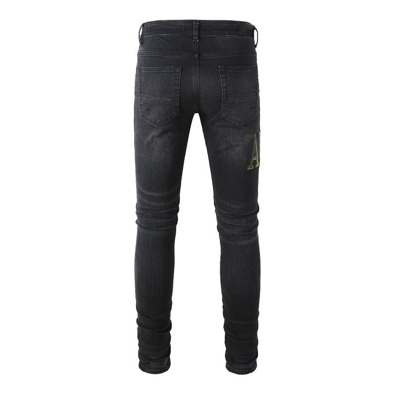 Pantalon en jean slim avec broderie de lettres et patch déchiré dans la rue #872