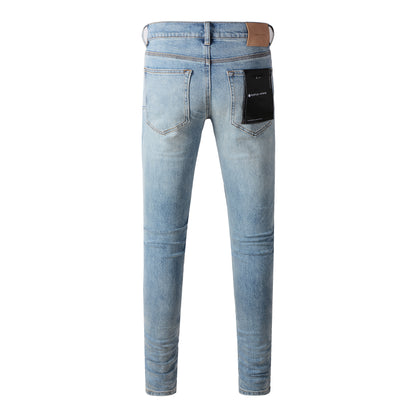 Fashionable Blue Ripped Jeans 9075 Featuring Distressed Design