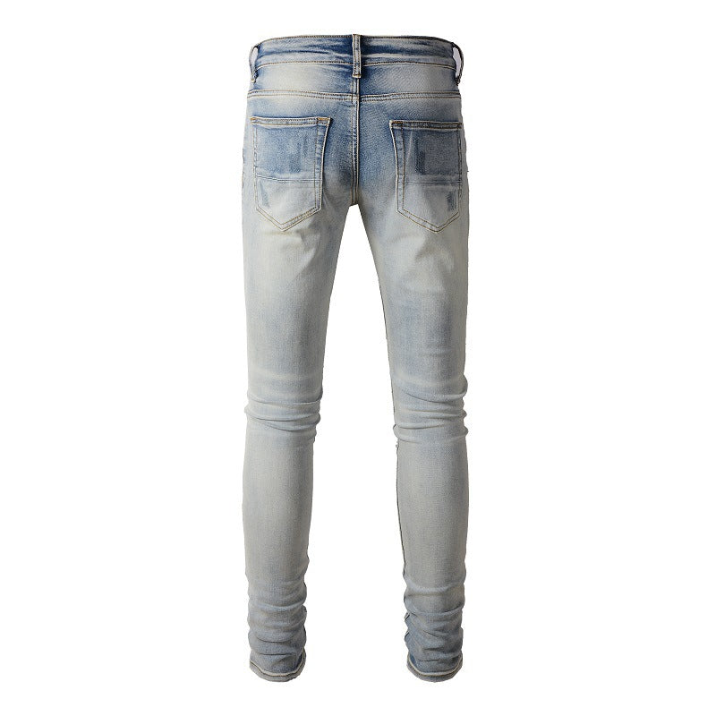 Pantalones vaqueros con parches rotos de SoldOut Street Pantalones vaqueros ajustados de High Street