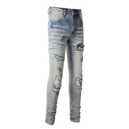 Pantalones vaqueros con parches rotos de SoldOut Street Pantalones vaqueros ajustados de High Street