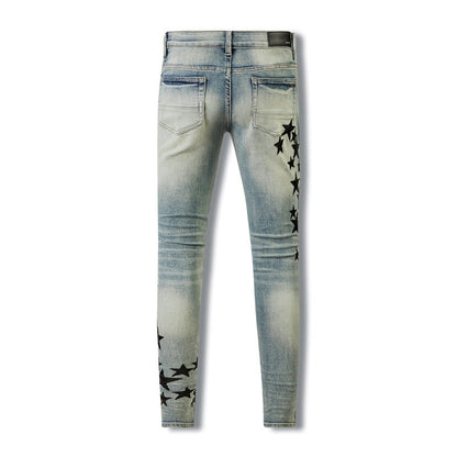 Denim bleu de style rétro avec délavage vieilli et accents en similicuir en forme d'étoile